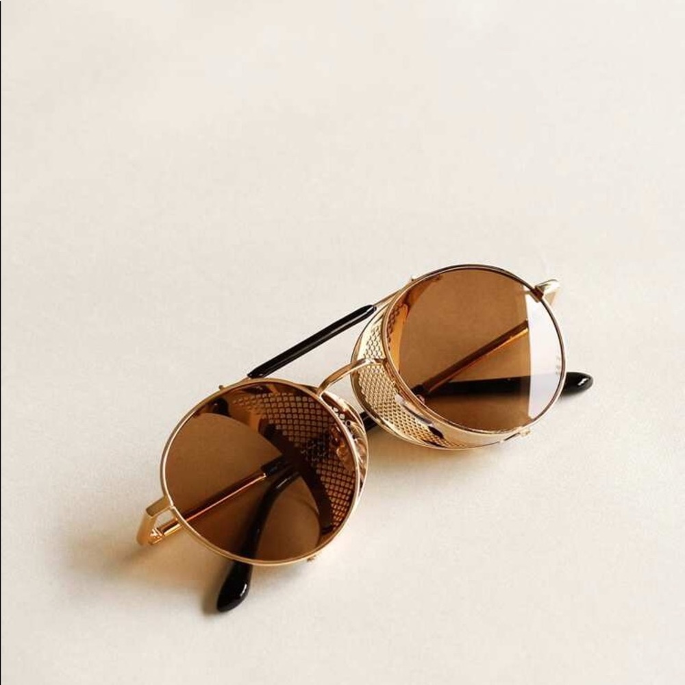 Gold plated rim sunglasses.